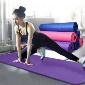 Person practicing yoga on a non-slip 4MM EVA yoga mat