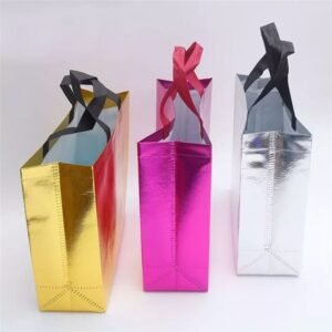 Luxurious Thamboolam bags in mixed colors for premium wedding return gifts.