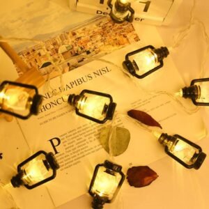 "LED lantern lights wrapped around a Christmas tree for festive decor"