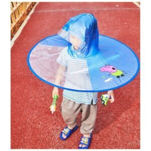 Child wearing a foldable waterproof umbrella hat in the rain.