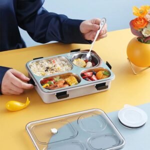 "Stainless Steel Lunch Box Open with Food Compartments Filled"