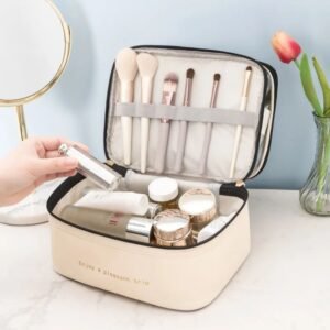 Front view of a double-layer cosmetic organizer with handle