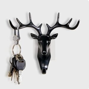 Decorative deer head hook for hanging towels in a bathroom