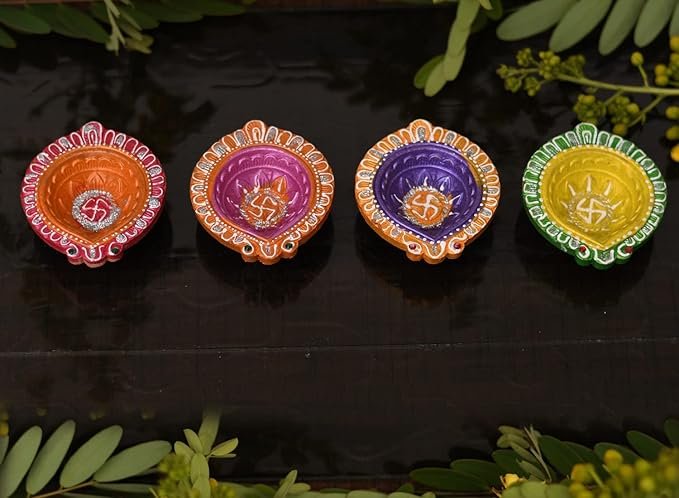 Traditional Earthen Diyas for Puja Decorative clay diyas with intricate detailing for Puja rituals
