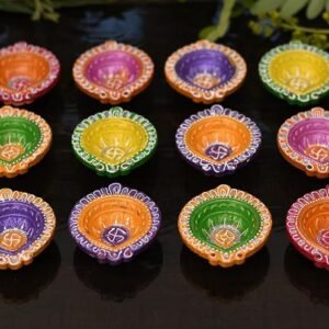 Colorful clay diyas set for festive decor and Diwali celebrations