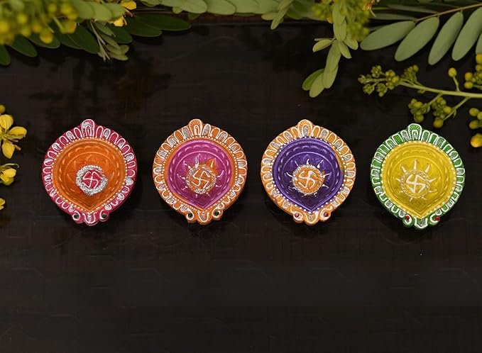 Decorative Terracotta Lamps for Festivals Decorative terracotta diyas with colorful designs for Diwali