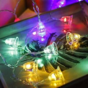 LED fairy lights draped over furniture indoors