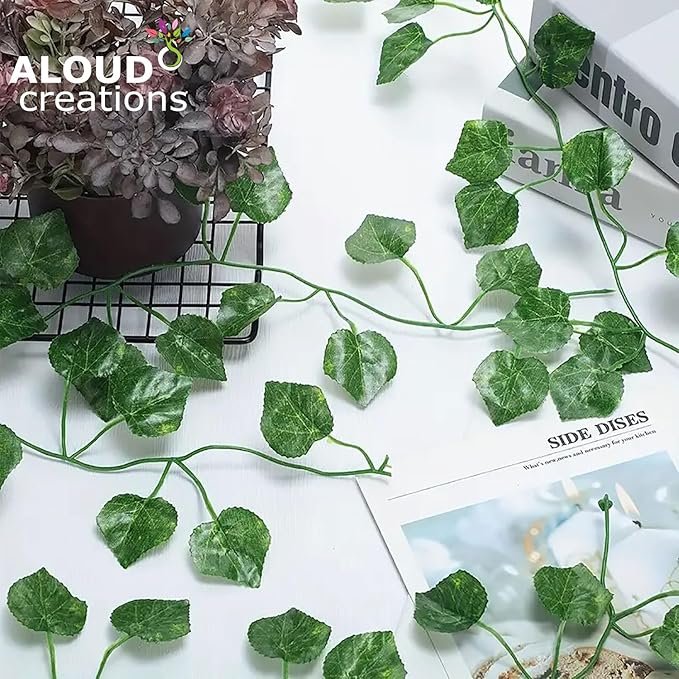 aloud-creations-12pc-artificial-green-leaf-vines-80-leaves-home-decor.webp Aloud Creations 12-piece artificial green leaf vine set with 80 realistic faux leaves for home, wall, balcony, and party decoration